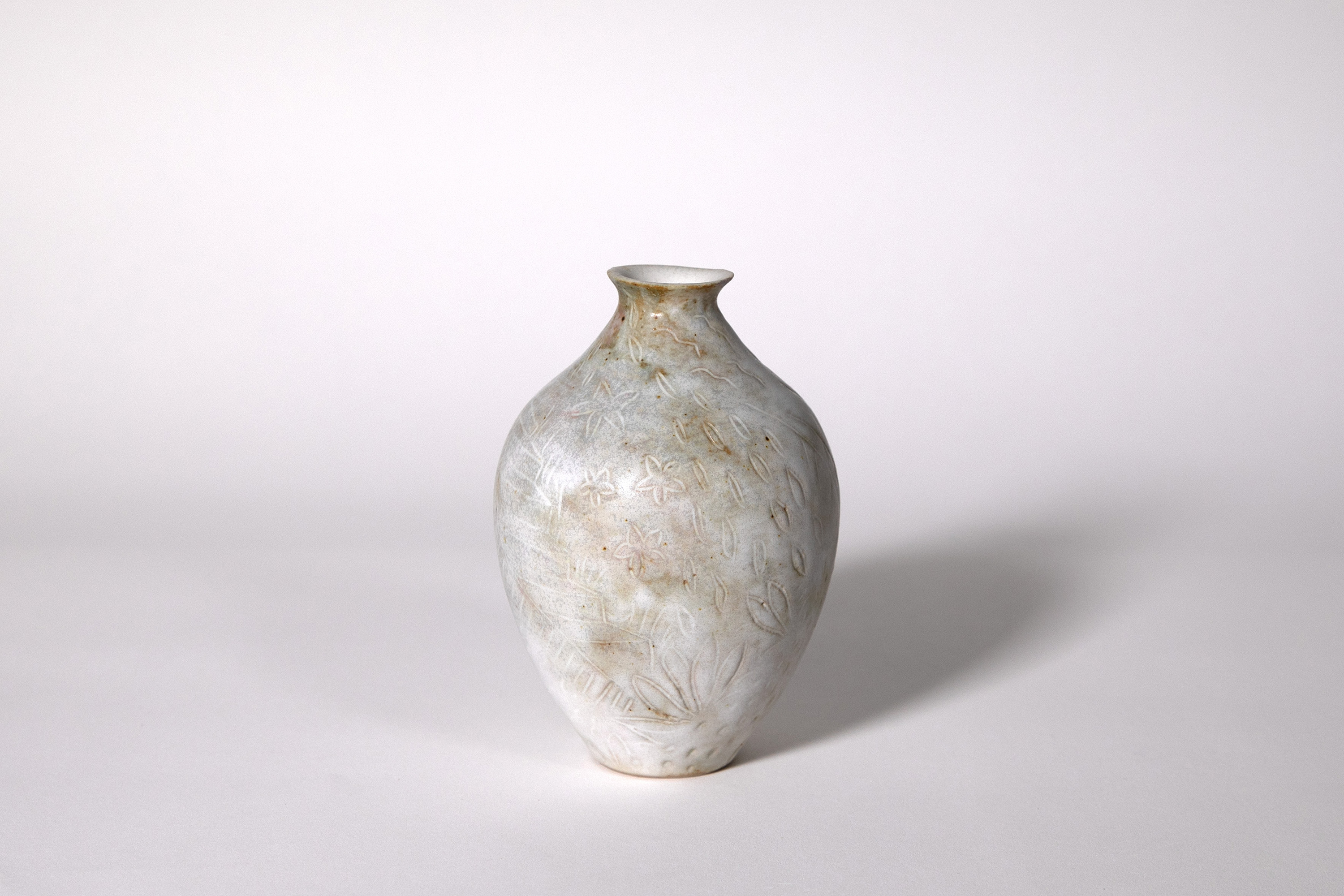 Antiqued sgraffito vase