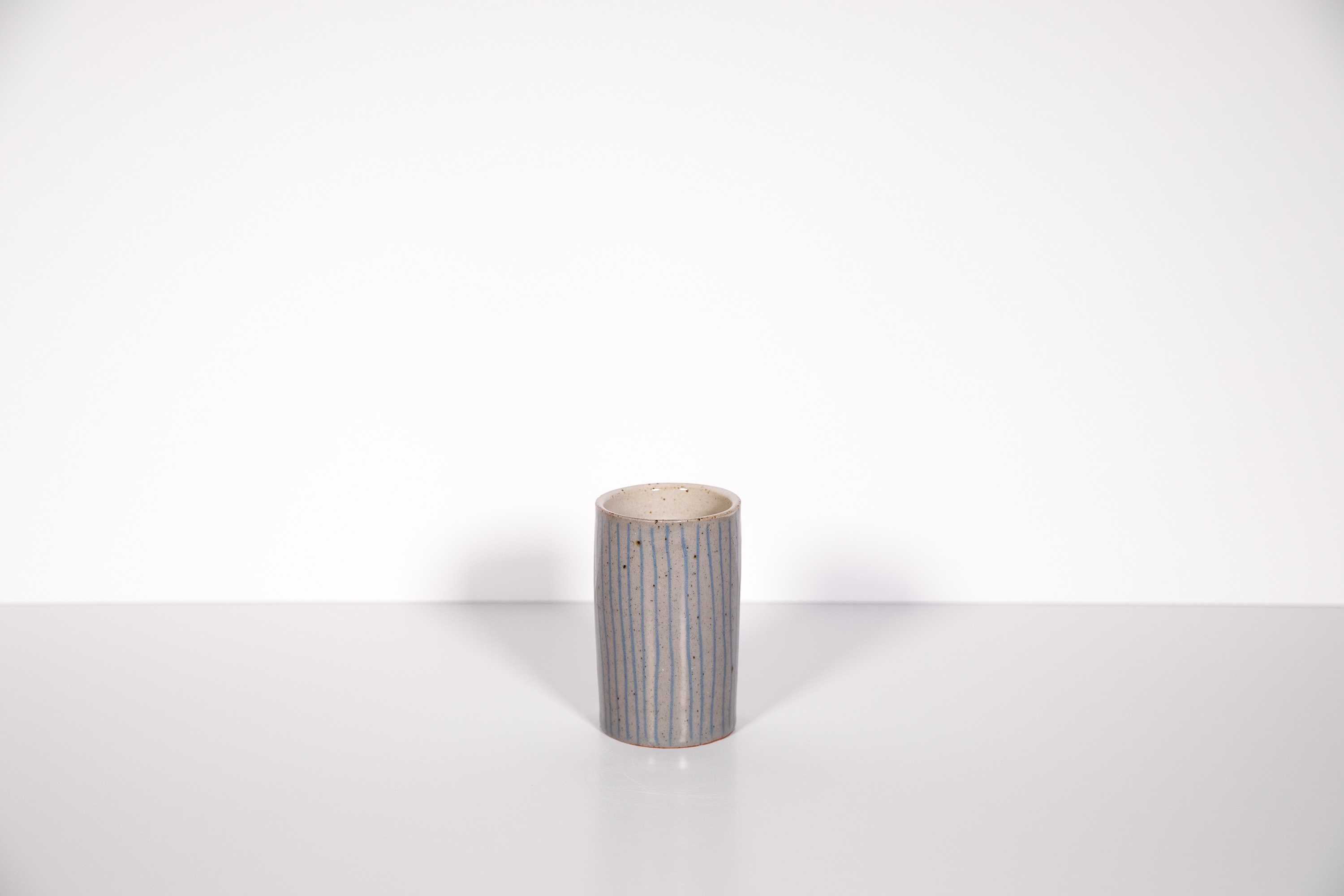 Stoneware cup with slip inlay