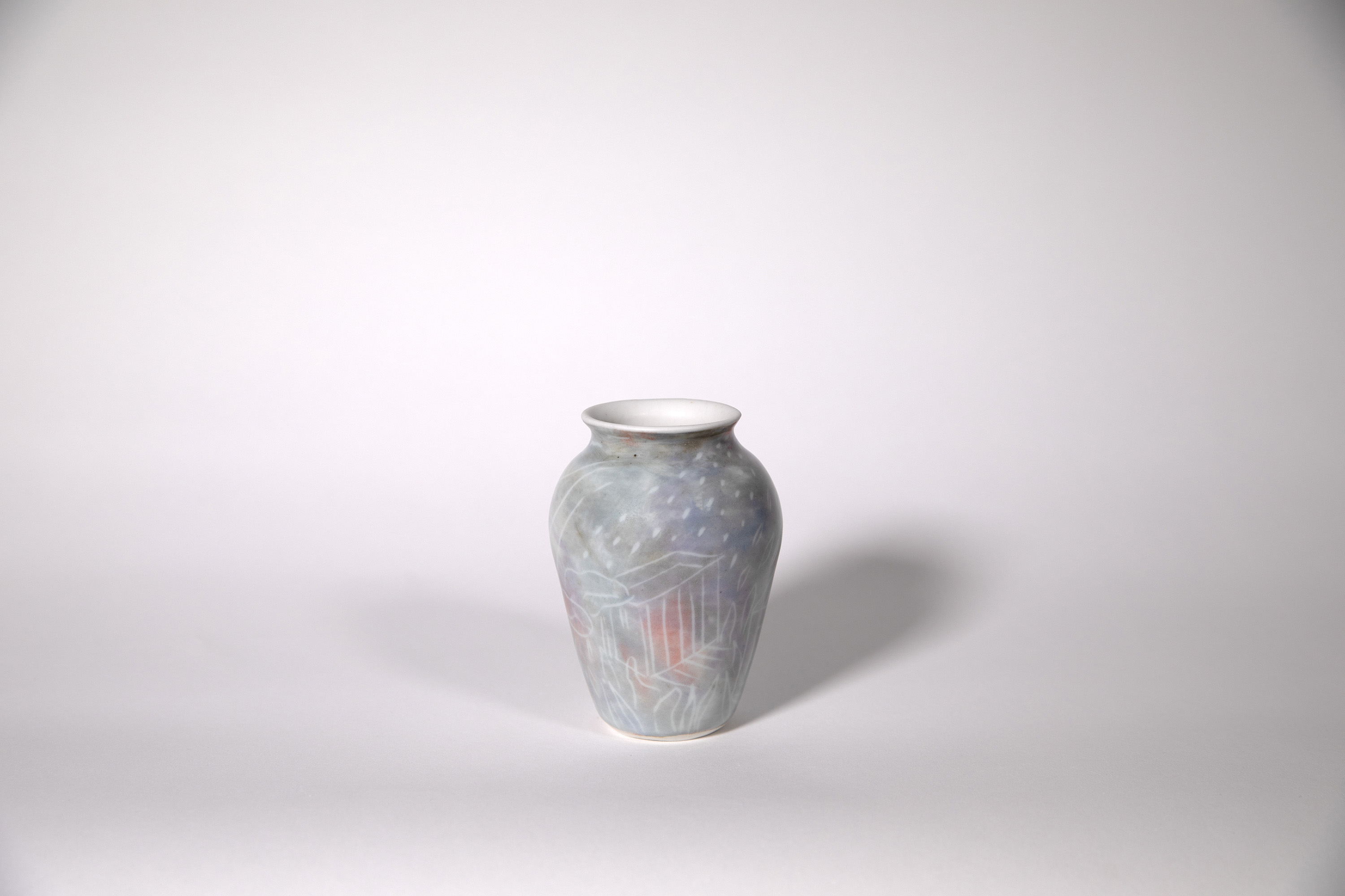 Porcelain sgraffito vase
